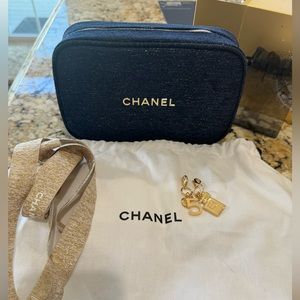 CHANEL blue makeup bag, dust bag and charms